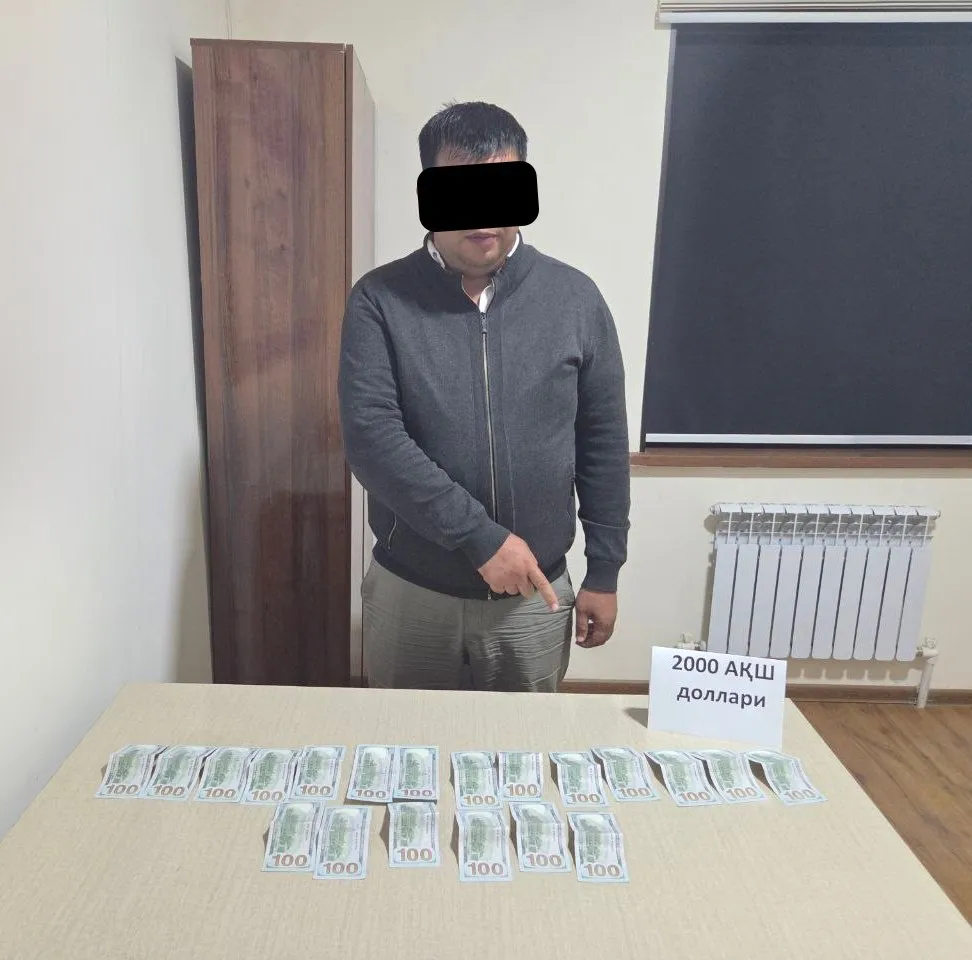 Қорақалпоғистонда кадастр бўлими раҳбари пора билан ушланди